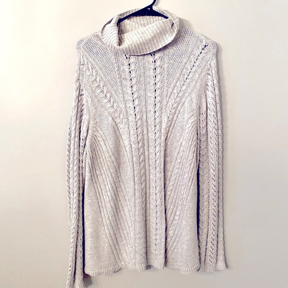 Knit sweater with loose turtle neck